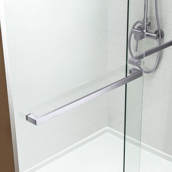 Frameless shower door with online towel bar